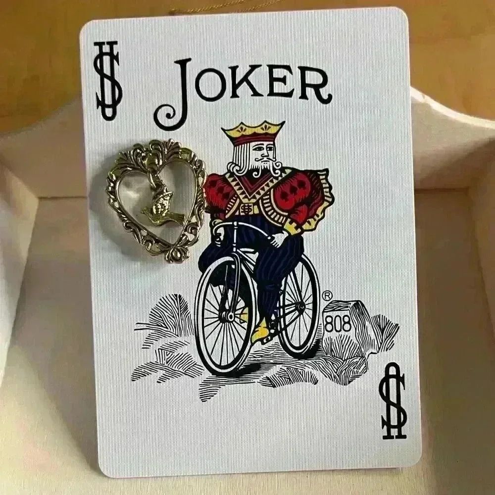 Vintage gold tone dove pin brooch dangle from heart